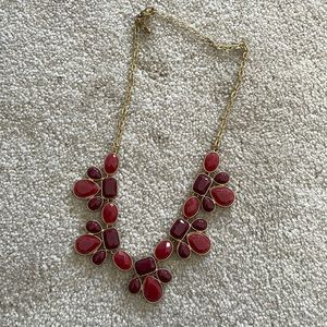 Francesca’s maroon gold statement necklace